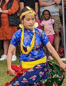  Gurung Lady Dancing at World in a Tent Festival